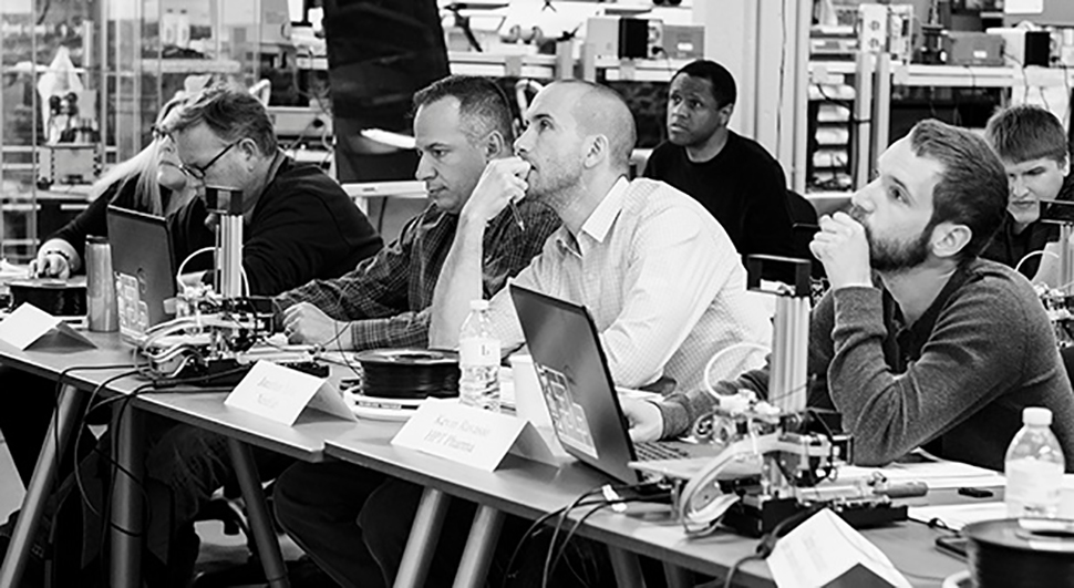 NextFab members in an electronics class