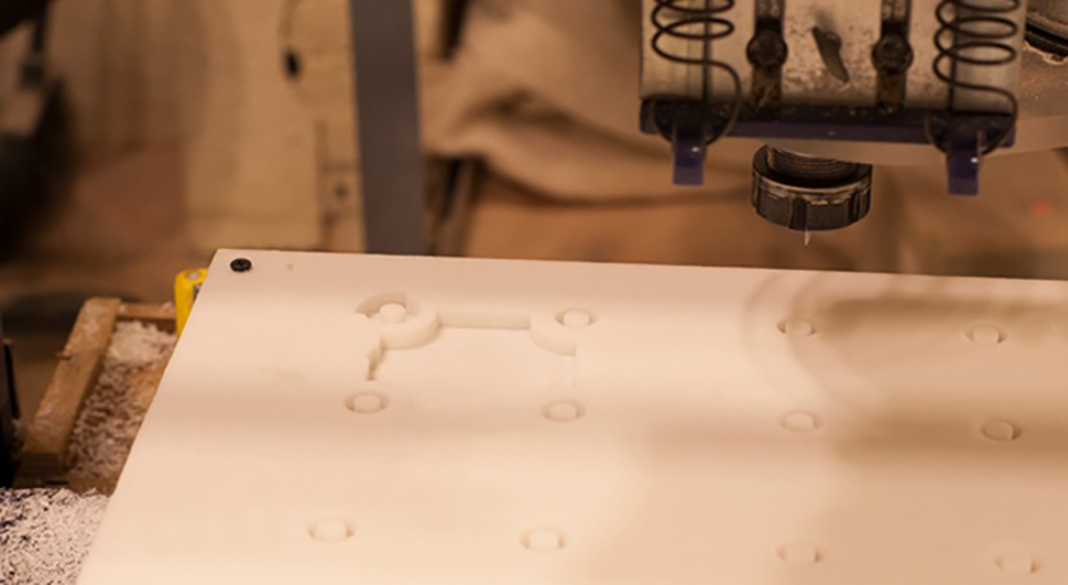 Close up of milling Corian with the ShopBot CNC Router at NextFab makerspace