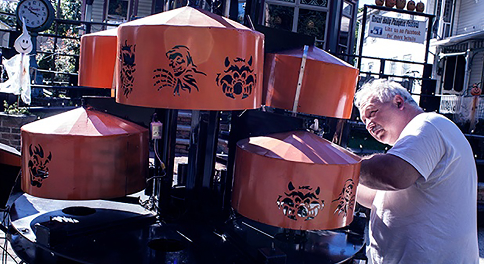 Rich Denisar with his pumpkin carving machine