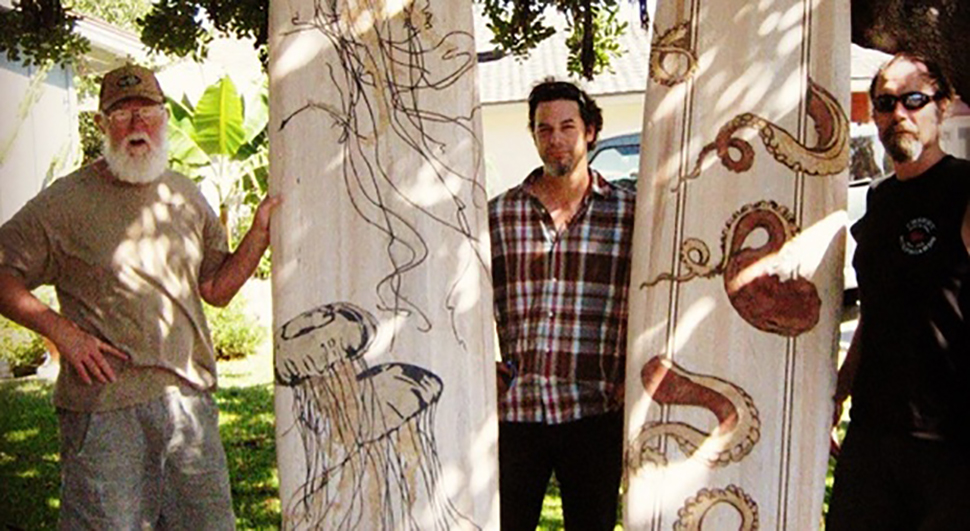 Ric Allison with surfboards he designed