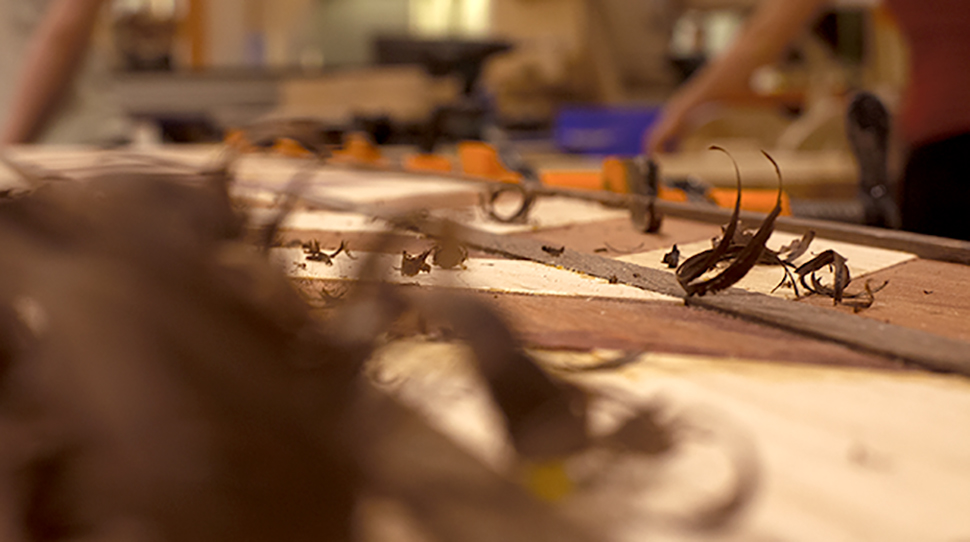 Close up of wooden table top build in process