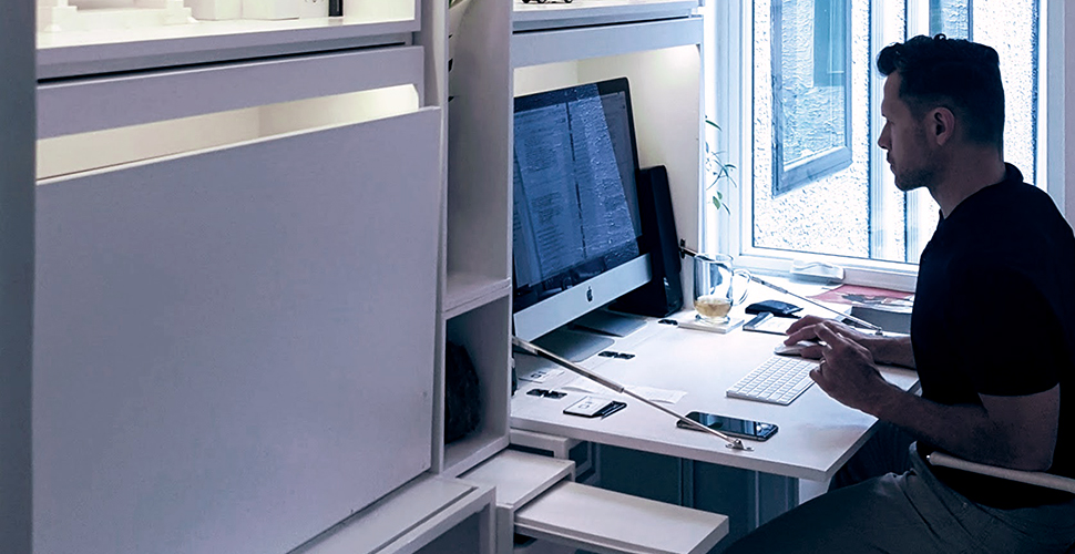 Modern workspace wall unit in use