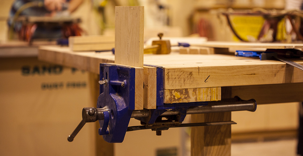 Close up of a wood shop work bench at NextFab makerspace