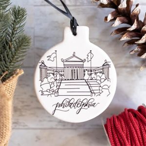 Girl Holding a Pen - timeless, calligraphy-style designs for life's best moments, including wedding/event stationery, invitations, signage decor, and Christmas ornaments 1