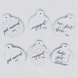 Girl Holding a Pen - timeless, calligraphy-style designs for life's best moments, including wedding/event stationery, invitations, signage decor, and Christmas ornaments 2
