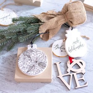 Girl Holding a Pen - timeless, calligraphy-style designs for life's best moments, including wedding/event stationery, invitations, signage decor, and Christmas ornaments 3