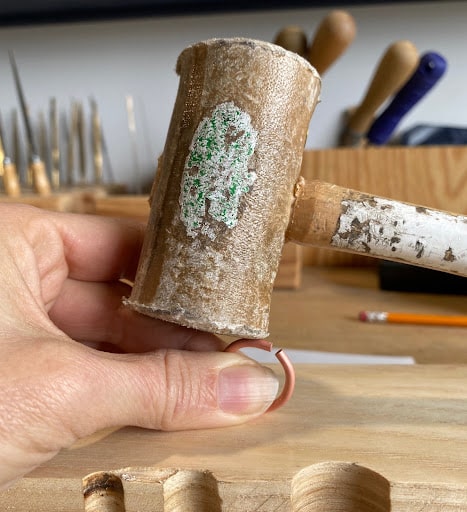using the SIDE of the forming block to hammer